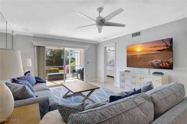 tiled living room with ornamental molding and ceiling fan