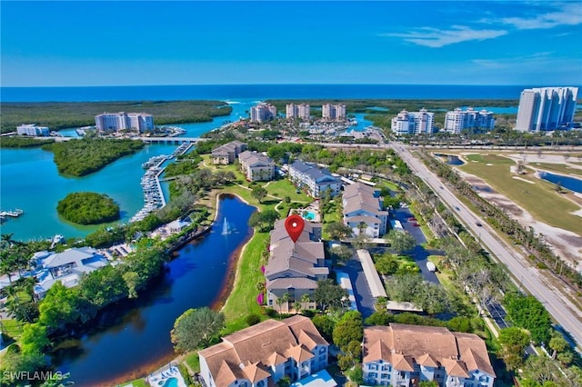 drone / aerial view with a water view