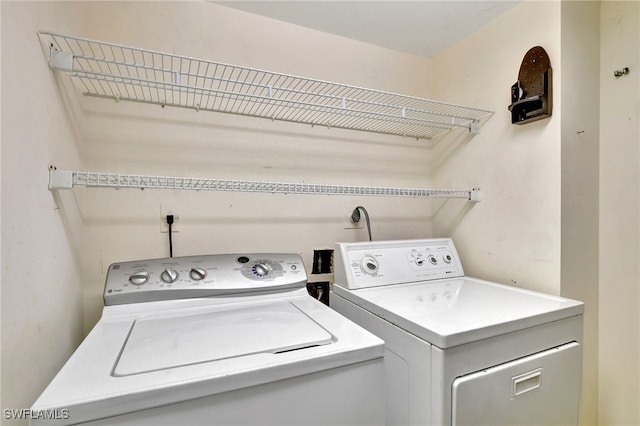 laundry area featuring separate washer and dryer