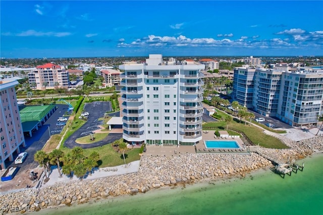 drone / aerial view with a view of the beach and a water view