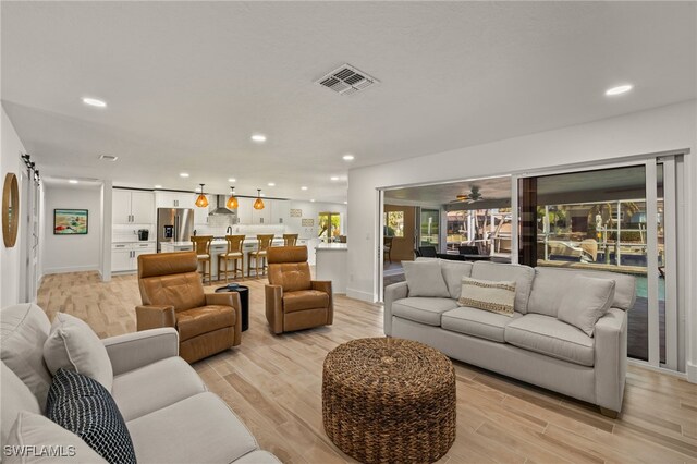 living room featuring light hardwood / wood-style floors