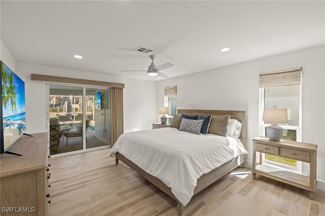 bedroom featuring ceiling fan, light hardwood / wood-style flooring, and access to outside