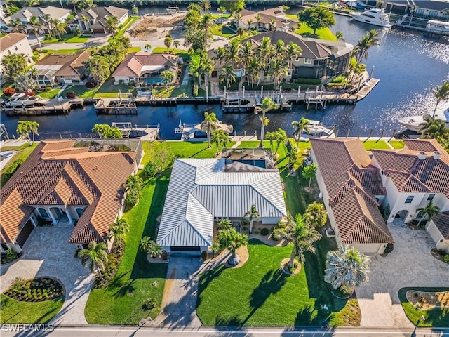 drone / aerial view with a water view