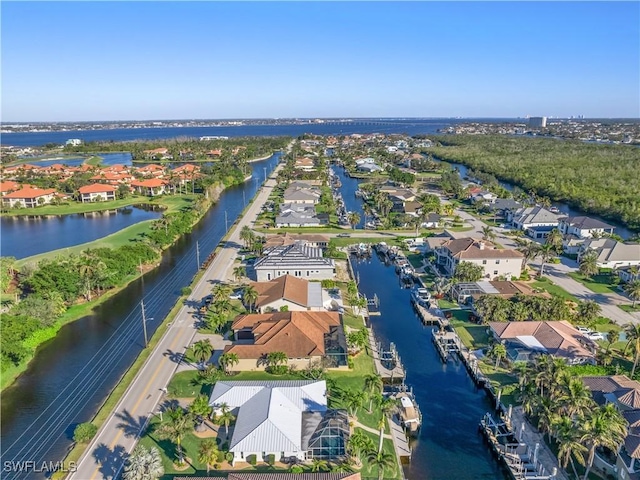 drone / aerial view with a water view