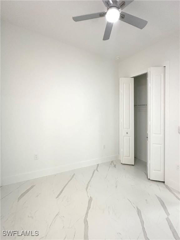 bedroom featuring ceiling fan and a closet