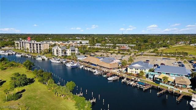 birds eye view of property featuring a water view