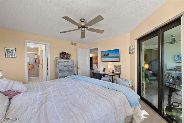 bedroom featuring a textured ceiling, access to exterior, visible vents, and a ceiling fan