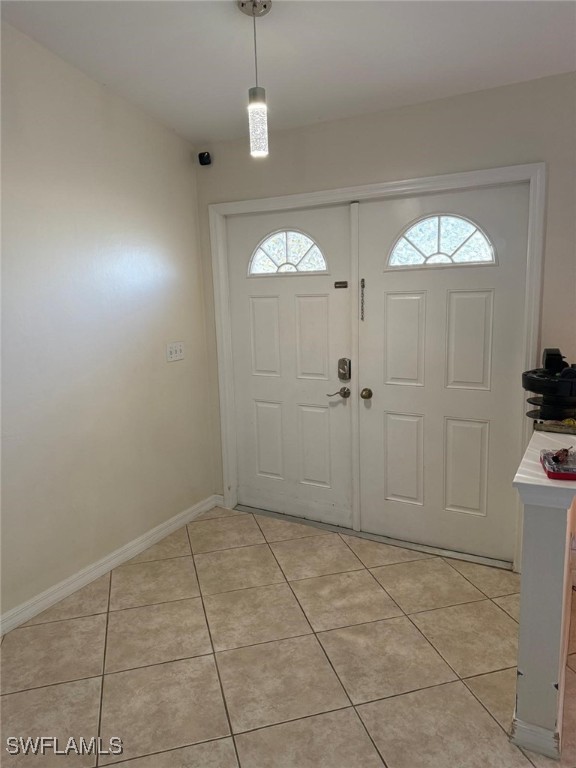 view of tiled foyer entrance