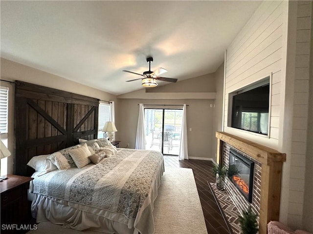 bedroom featuring lofted ceiling, access to exterior, and ceiling fan