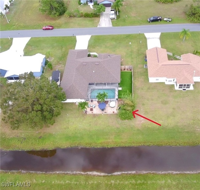 drone / aerial view featuring a water view