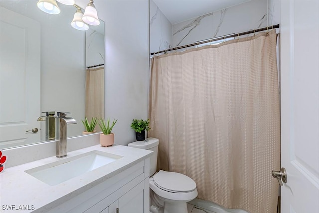 bathroom featuring a shower with curtain, vanity, and toilet