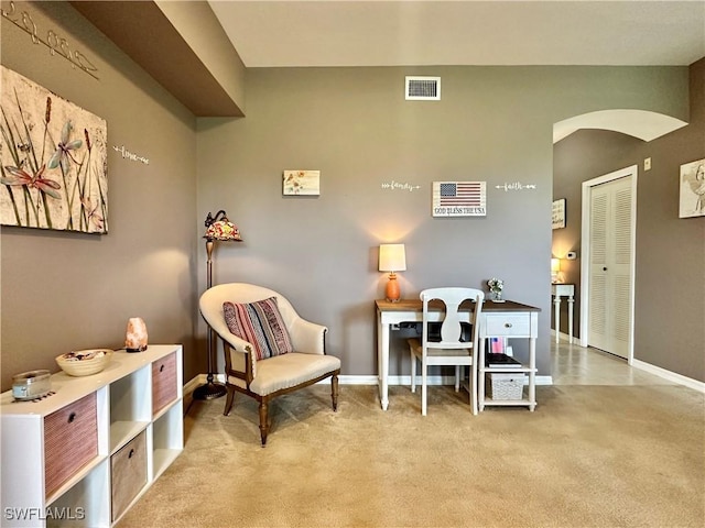 sitting room with light carpet