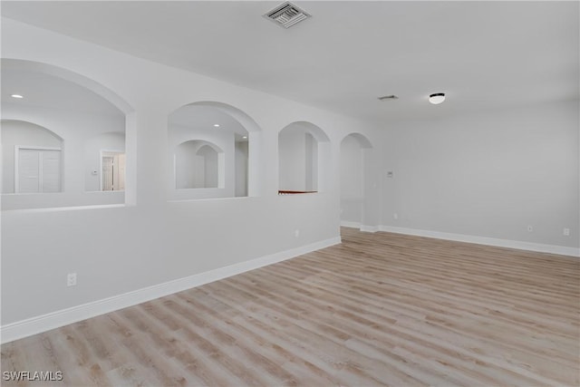 unfurnished room featuring light hardwood / wood-style flooring