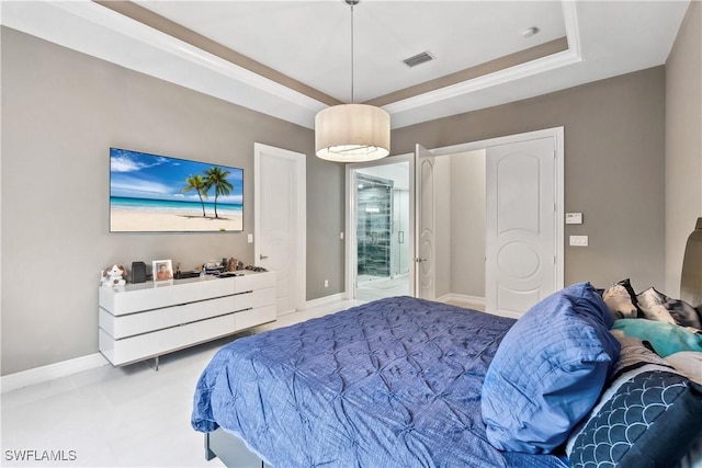 bedroom with a tray ceiling