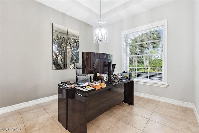 tiled office featuring a notable chandelier