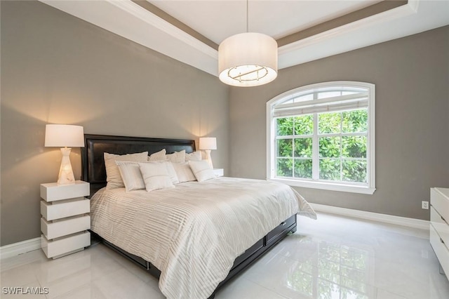 850 25th St SW, Naples, FL 34117 - bedroom featuring baseboards, light tile patterned flooring, and a raised ceiling