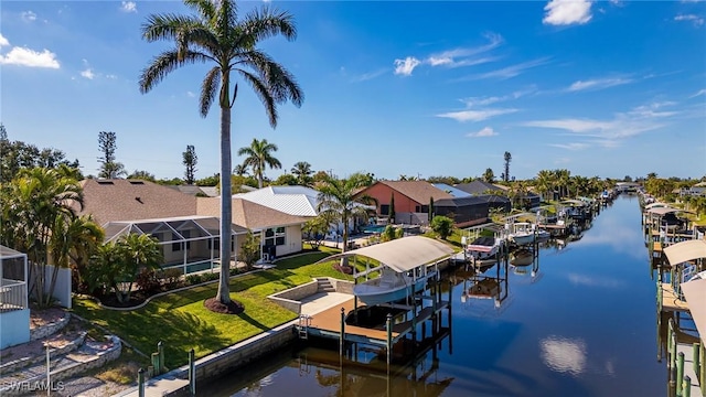 dock area with a water view and glass enclosure