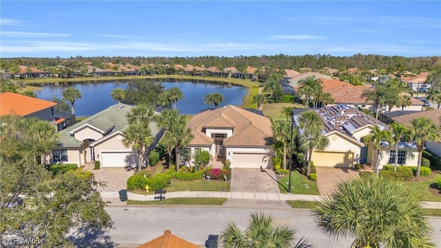 drone / aerial view featuring a water view