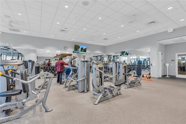 exercise room with a drop ceiling