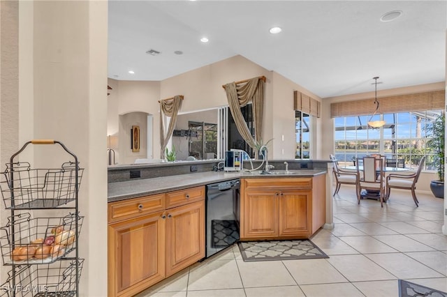 kitchen with sink, black dishwasher, light tile patterned flooring, decorative light fixtures, and kitchen peninsula