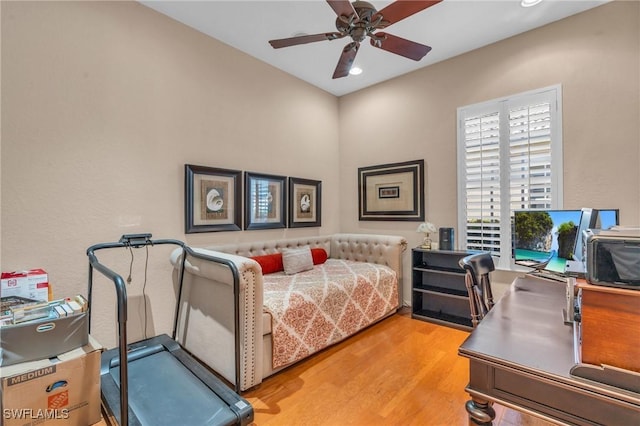 bedroom featuring ceiling fan and light hardwood / wood-style floors