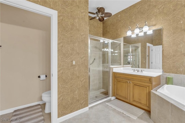 full bathroom with tile patterned floors, toilet, vanity, independent shower and bath, and ceiling fan