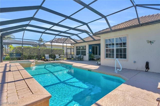12890 Kentfield Ln, Fort Myers, FL 33913 - pool featuring a lanai and a patio