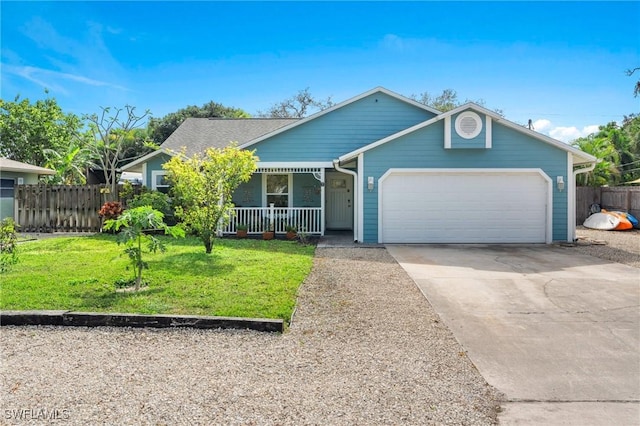 ranch-style house with a garage, a porch, and a front lawn