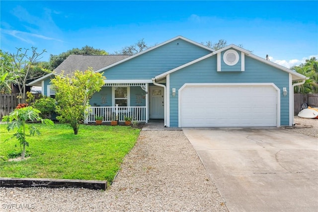 ranch-style home with a porch, a garage, and a front yard