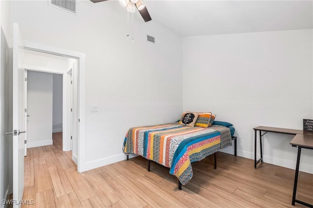 bedroom featuring light hardwood / wood-style flooring and ceiling fan