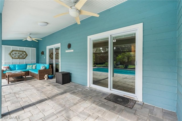 view of patio featuring an outdoor hangout area and ceiling fan