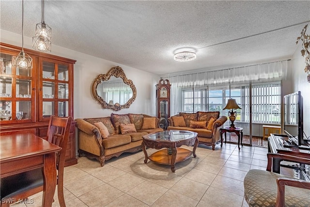 tiled living room with a textured ceiling