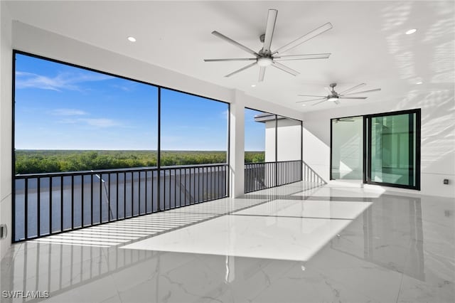 unfurnished sunroom featuring a healthy amount of sunlight