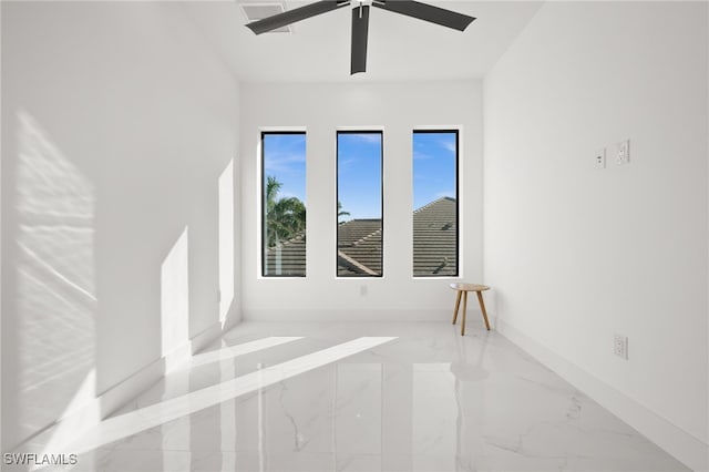 empty room featuring ceiling fan