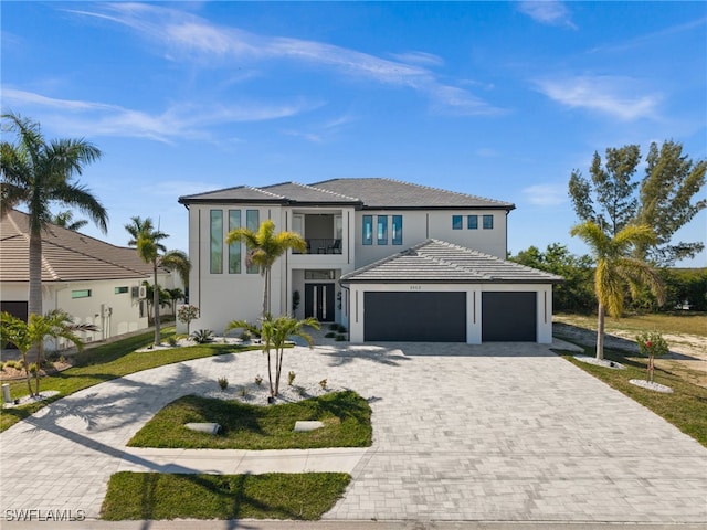 view of front of property with a balcony