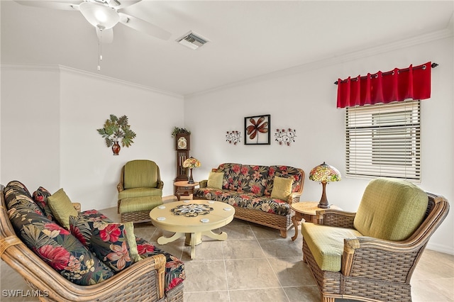 tiled living room featuring crown molding and ceiling fan