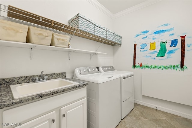 laundry room featuring sink, light tile patterned floors, ornamental molding, and washer and dryer