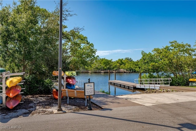 dock area with a water view