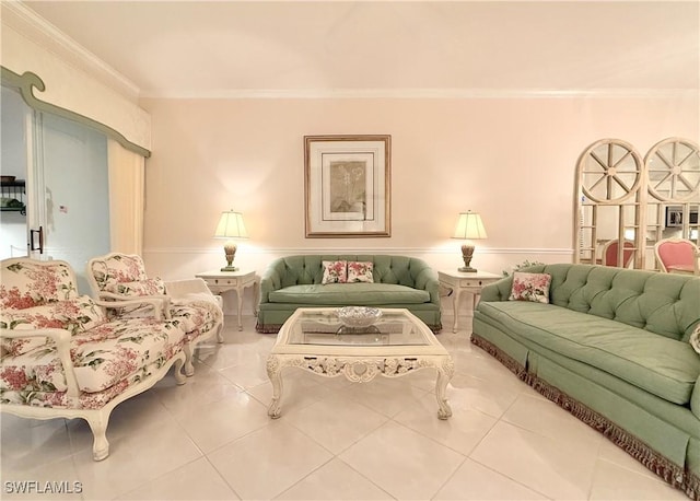 living room with tile patterned flooring and ornamental molding