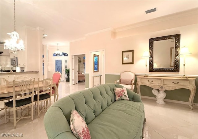 tiled living room featuring crown molding and a chandelier