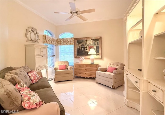 sitting room featuring ceiling fan, ornamental molding, and light tile patterned floors