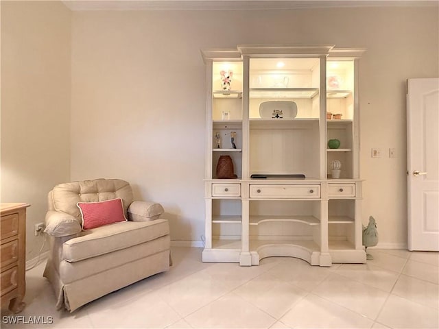 sitting room featuring tile patterned floors