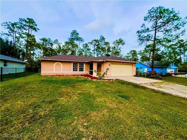 ranch-style home with a garage and a front yard