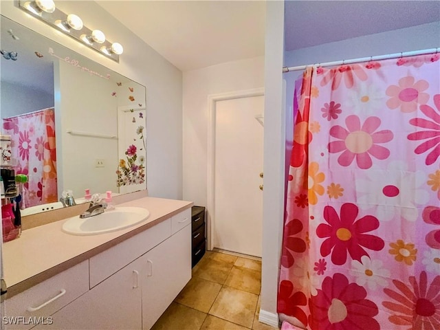 bathroom featuring vanity and tile patterned floors