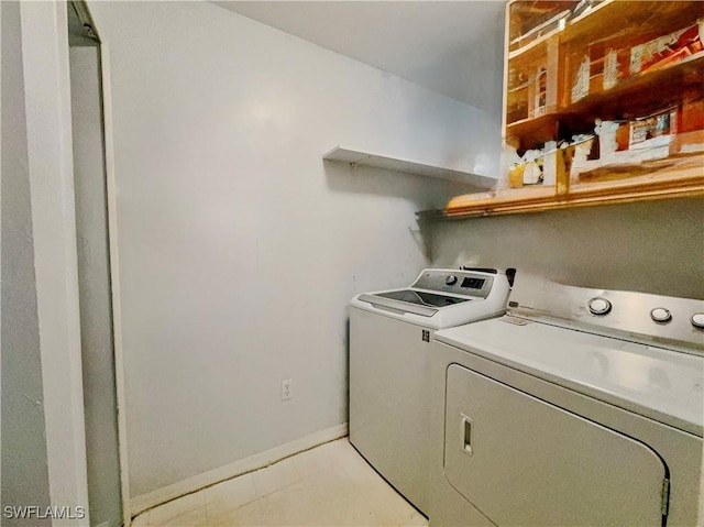 laundry room with washer and dryer