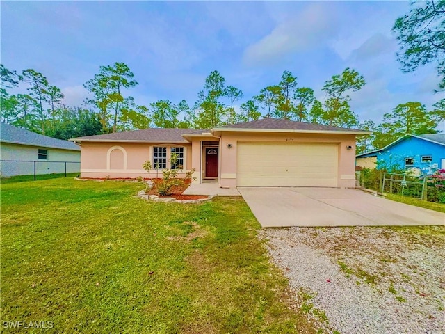 single story home with a garage and a front yard