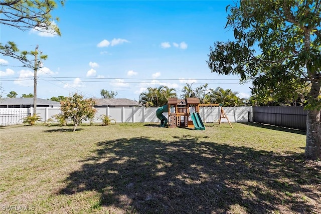 view of yard with a playground