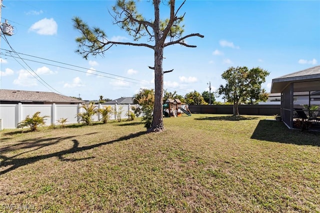 view of yard with a playground