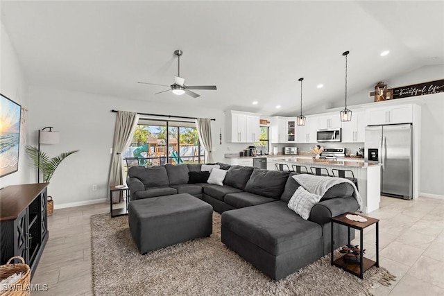 living room with vaulted ceiling and ceiling fan