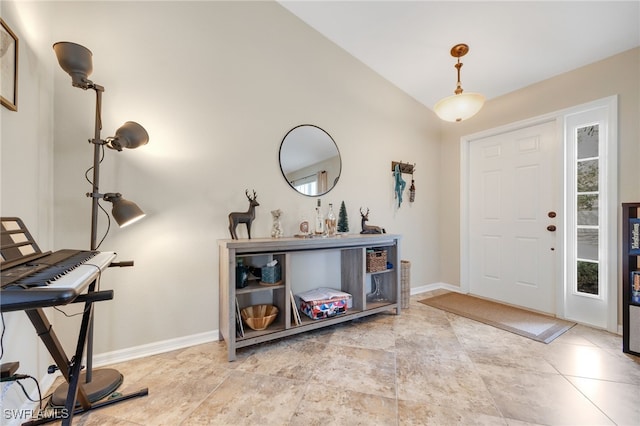 13404 Bristol Park Way, Fort Myers, FL 33913 - entryway featuring baseboards and vaulted ceiling